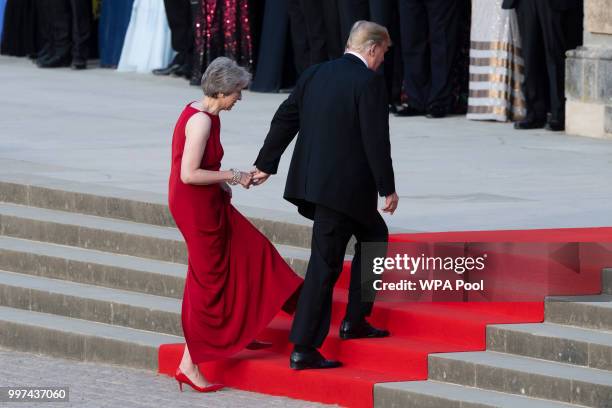 Britain's Prime Minister Theresa May welcomes U.S. President Donald Trump at Blenheim Palace on July 12, 2018 in Woodstock, England. Blenheim Palace...