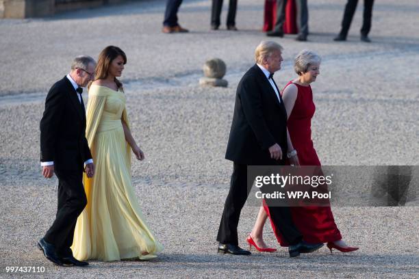 Britain's Prime Minister Theresa May and her husband Philip May greet U.S. President Donald Trump and First Lady Melania Trump at Blenheim Palace on...