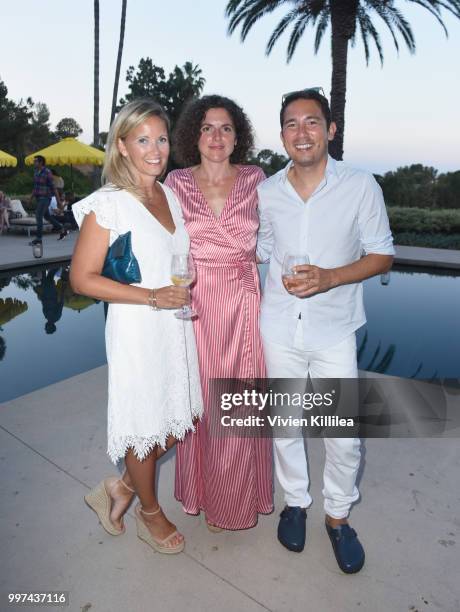 Rebecca Rand, Chloe Tolmer and George Fleck attend Garance Doré, founder of Atelier Doré, celebrates Au Soleil:A Summer Soirée by Le Méridien  a...