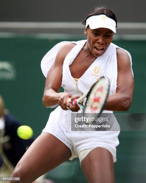 Venus Williams of the USA in action on Day Five of the Wimbledon Lawn Tennis Championships at the All England Lawn Tennis and Croquet Club in London...