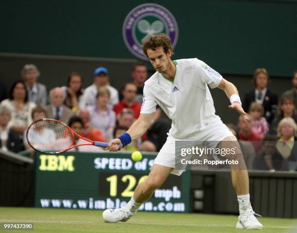 Andy Murray of Great Britain in action on Day Five of the Wimbledon Lawn Tennis Championships at the All England Lawn Tennis and Croquet Club in...