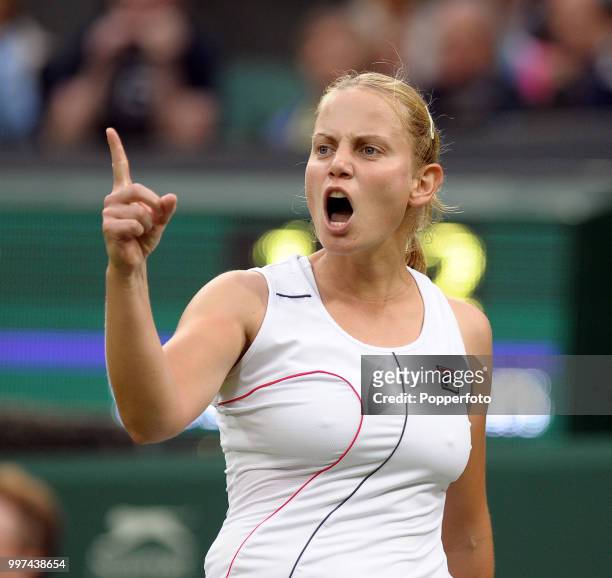 Jelena Dokic of Australia reacts on Day One of the Wimbledon Lawn Tennis Championships at the All England Lawn Tennis and Croquet Club in London on...