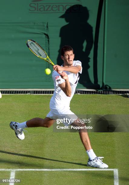 James Ward of Great Britain in action on Day Two of the Wimbledon Lawn Tennis Championships at the All England Lawn Tennis and Croquet Club in London...
