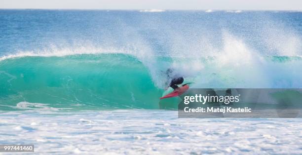 Beach Wave Riding Rafts Riding A Wave Photos and Premium High Res Pictures - Getty Images
