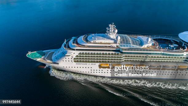 serenade of the seas cruiser ship passing by in the stockholm swedish archipelago - remus kotsell stock pictures, royalty-free photos & images