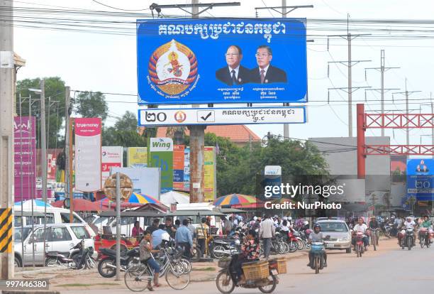 An election poster with images of Heng Samrin - Honorary President of the Cambodian People's Party and Hun Sen - Prime Minister of Cambodia and...