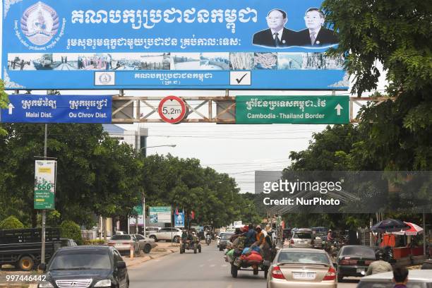 An election poster in Krong Poi Pet with images of Heng Samrin - Honorary President of the Cambodian People's Party and Hun Sen - Prime Minister of...