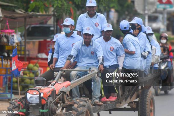 Supporters of the ruling Cambodian People's Party during a party election rally, as the general election campaign kicked off on Saturday, 7 July...