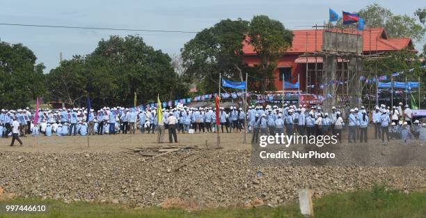 Supporters of the ruling Cambodian People's Party during a party election rally, as the general election campaign kicked off on Saturday, 7 July...