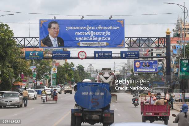 An election poster with an image of Hun Sen - Prime Minister of Cambodia and President of the Cambodian People's Party, as the general election...