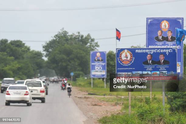 Election posters with images of Heng Samrin - Honorary President of the Cambodian People's Party and Hun Sen - Prime Minister of Cambodia and...