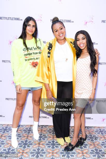 Guest, Amy Simon and Teala Dunn attend PrettyLittleThing Hosts Private Influencer Dinner at Beauty & Essex on July 12, 2018 in Los Angeles,...