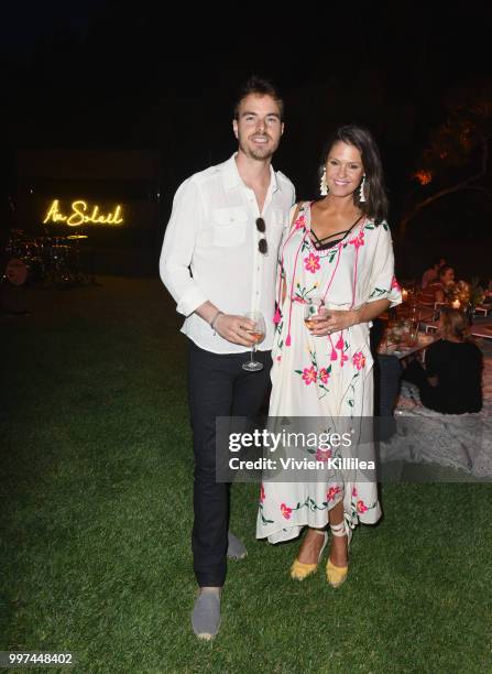 Nick Brown and Dominique Peik attend Garance Doré, founder of Atelier Doré, celebrates Au Soleil:A Summer Soirée by Le Méridien  a global programme...