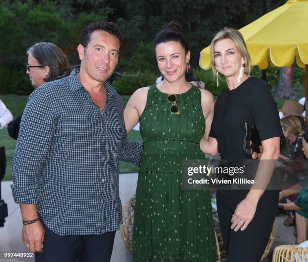 Giovanni Giuliano, Garance Doré and Jennifer Dowd Giuliano attend Garance Doré, founder of Atelier Doré, celebrates Au Soleil:A Summer Soirée by Le...