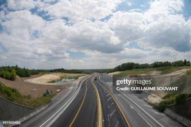 Picture taken on July 12, 2018 shows traffic near the construction site of the doubling viaduc of the highway A85 near Langeais. The 653-meter long...