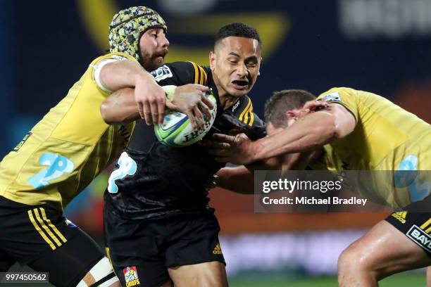 Chiefs Toni Pulu looks to break the defence during the round 19 Super Rugby match between the Chiefs and the Hurricanes at Waikato Stadium on July...