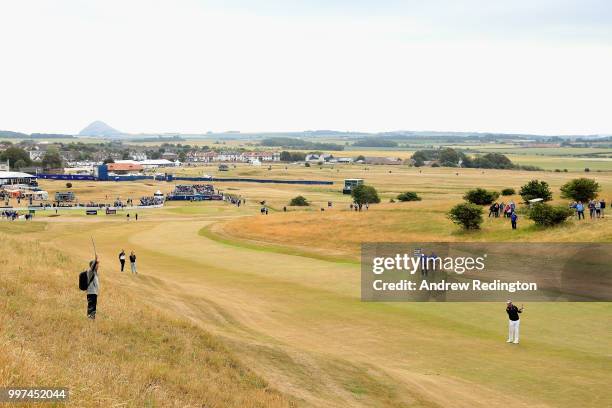 Lee Westwood of England takes his second shot on hole one during day two of the Aberdeen Standard Investments Scottish Open at Gullane Golf Course on...