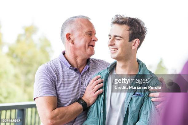 two men in conversation - androgynous boys stock pictures, royalty-free photos & images