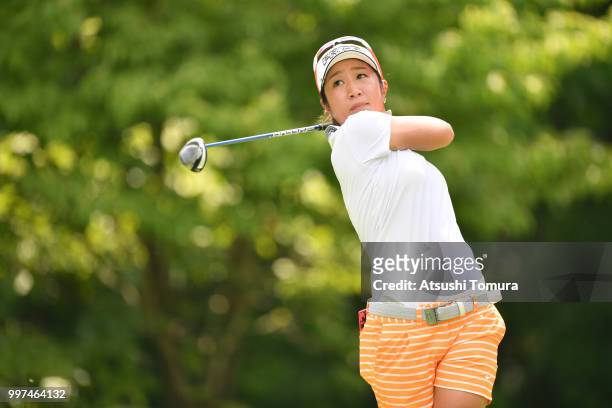 Asako Fujimoto of Japan hits her tee shot on the 4th hole during the first round of the Samantha Thavasa Girls Collection Ladies Tournament at the...
