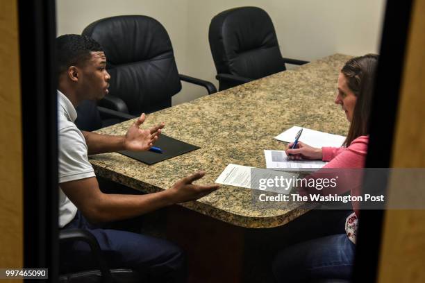 Isaiah Hall responds to a question from Crystal Sauser, a public relations manager, during a job interview at AirLite Plastics in North Omaha on...