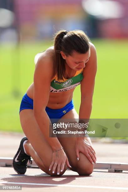 Amanda Hansson of Sweden reacts after being disqualified during heat 3 of the women's 100m hurdles on day four of The IAAF World U20 Championships on...