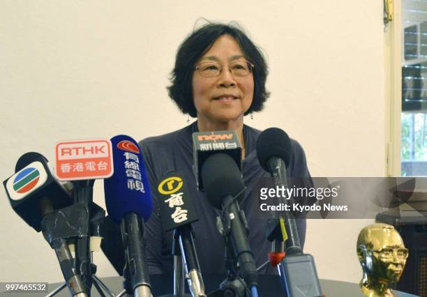 Germany-based author Tienchi Martin Liao speaks at a press conference in Berlin on July 12 about Liu Xia, the widow of Chinese Nobel Peace...