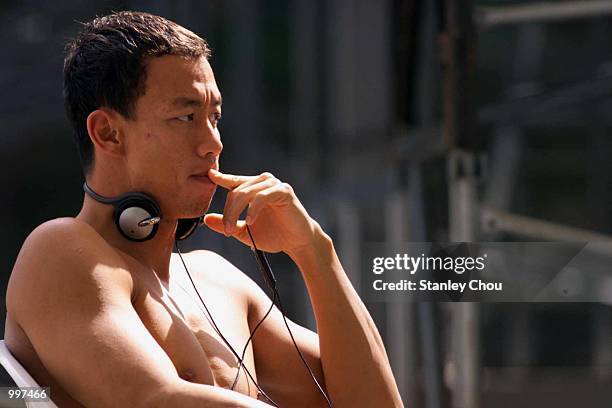Richard Sambera of Indonesia relaxes after a training session for the 21st South East Asian Games at the Bukit Jalil Aquatic Center, Kuala Lumpur,...