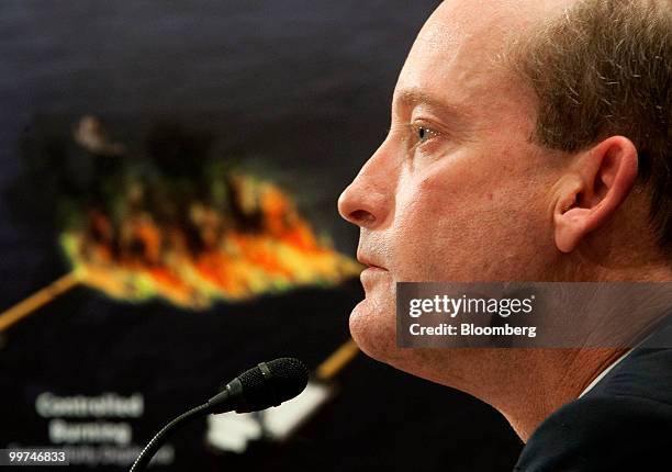 Lamar McKay, chairman of BP America Inc., testifies at a Senate Homeland Security Committee hearing as a graphic is displayed in the background in...