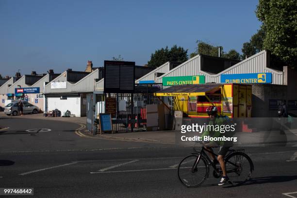 Cyclist rides past the Zennor Tradepark trading estate in the Balham district of south London, U.K., on Friday, Jun. 29, 2018. Nevermind West End...