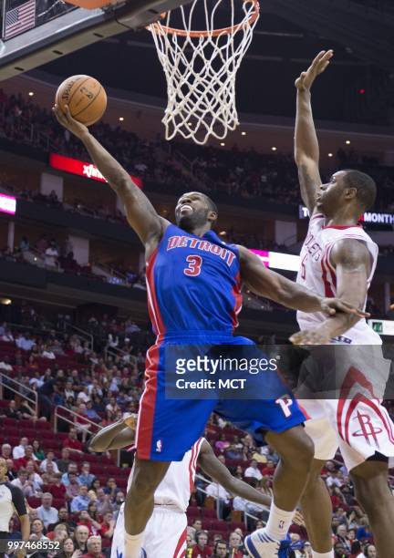 Rodney Stuckey of the Detroit Pistons shoots against Terrence Jones of the Houston Rockets on March 1 in Houston.