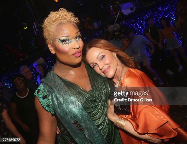 RuPaul's Drag Race Star and actress Peppermint and Go-Go's band member Belinda Carlisle pose backstage after a special curtain call at the new hit...