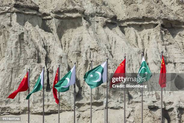 Chinese national flags fly next to Pakistani national flags at the Gwadar port in Gwadar, in Balochistan, Pakistan, on Tuesday, July 4, 2018. What...