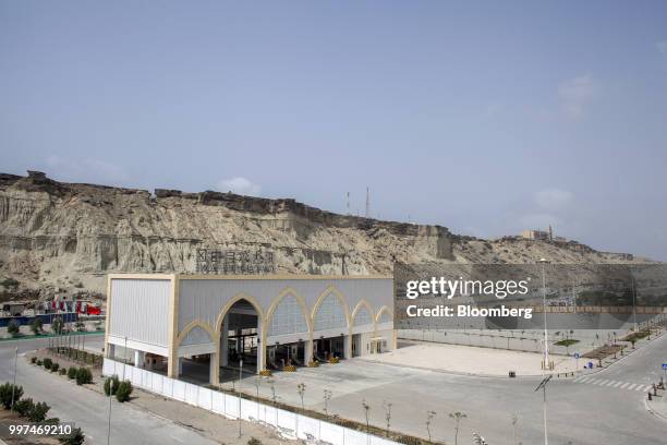 An entrance gate to the Gwadar Free Zone, operated by China Overseas Ports Holding Co., stands in Gwadar, Balochistan, Pakistan, on Tuesday, July 4,...