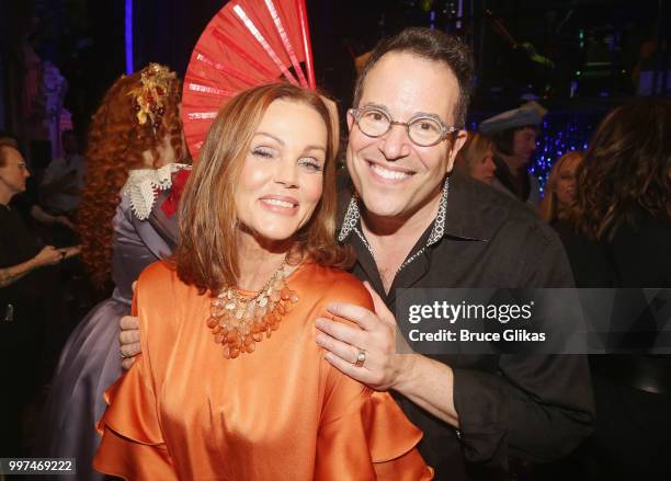 The Go-Go's band member Belinda Carlisle and Director Michael Mayer pose backstage after a special curtain call at the new hit musical featuring The...