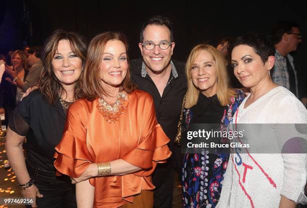 The Go-Go's band members Kathy Valentine, Belinda Carlisle,Charlotte Caffey and Jane Wiedlin pose with Director Michael Mayer backstage after a...