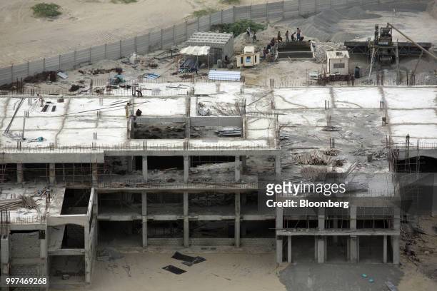 Building stands under construction at a development site, operated by China Overseas Ports Holding Co., near Gwadar Port in Gwadar, Balochistan,...