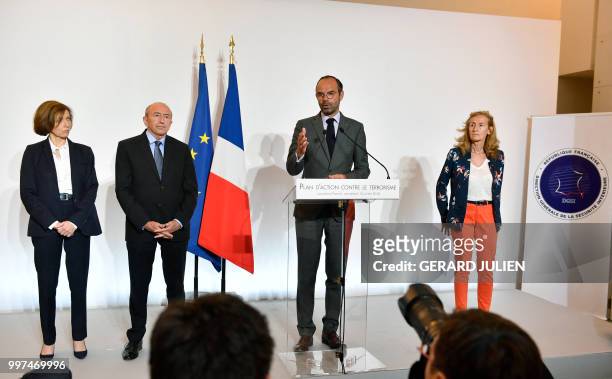 French Prime Minister Edouard Philippe flanked by French Defence Minister Florence Parly , French Minister of the Interior Gerard Collomb and French...