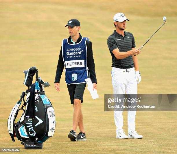 Thomas Pieters of Belgium and his caddy Adam Marrow look on, on hole four during day two of the Aberdeen Standard Investments Scottish Open at...