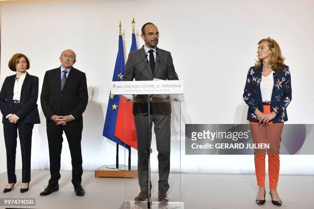 French Prime Minister Edouard Philippe flanked by French Defence Minister Florence Parly , French Minister of the Interior Gerard Collomb and French...