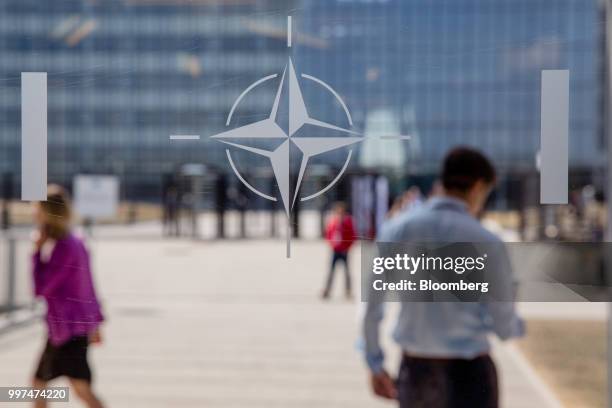 The NATO Star logo sits on a glass panel during the military and political alliance's summit at the North Atlantic Treaty Organization headquarters...