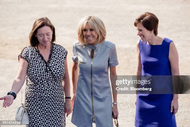 Ingrid Schulerud, wife of North Atlantic Treaty Organization secretary general Jens Stoltenberg, left, Brigitte Macron, wife of Frances President...