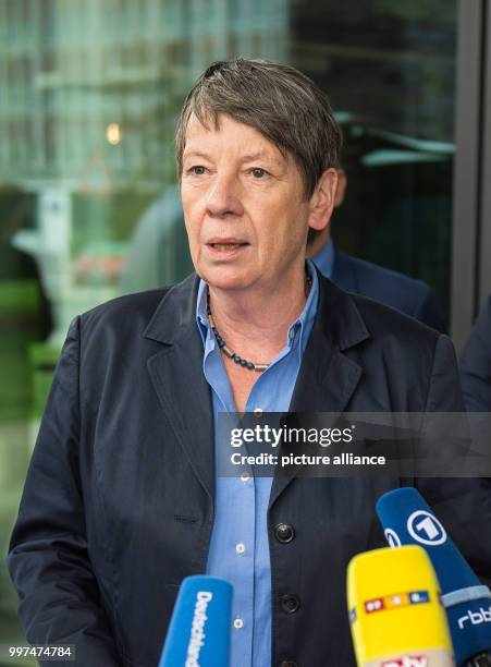 German environment minister Barbara Hendricks talks to the press outside the Volkswagen factory in Wolfsburg, Germany, 27 July 2017. The minister...