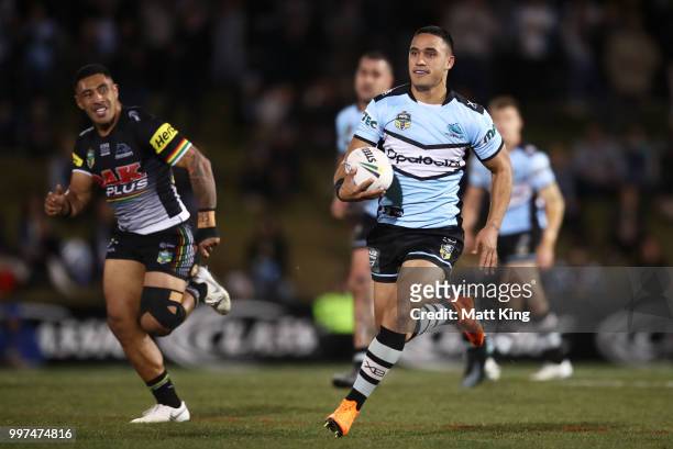 Valentine Holmes of the Sharks makes a break during the round 18 NRL match between the Panthers and the Sharks at Panthers Stadium on July 13, 2018...