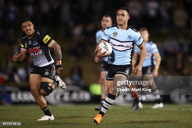 Valentine Holmes of the Sharks makes a break during the round 18 NRL match between the Panthers and the Sharks at Panthers Stadium on July 13, 2018...