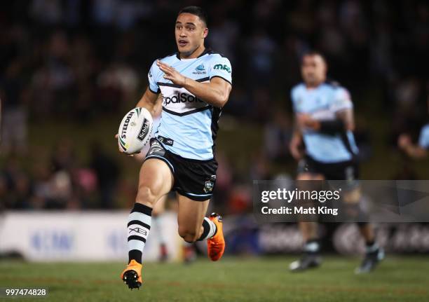 Valentine Holmes of the Sharks makes a break during the round 18 NRL match between the Panthers and the Sharks at Panthers Stadium on July 13, 2018...