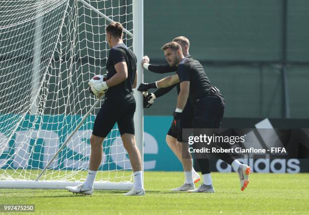 Goalkeepers Nick Pope, Jack Butland and Jordan Pickford of England look on during an England training session during the 2018 FIFA World Cup Russia...