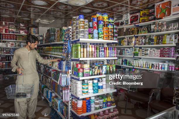 Customer shops at a Pak China Supermarket in Gwadar, Balochistan, Pakistan, on Tuesday, July 4, 2018. What used to be a small fishing town on the...