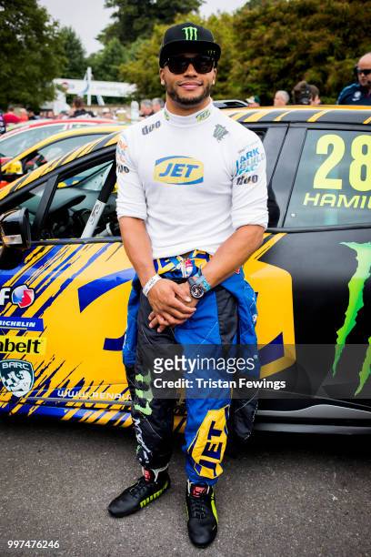 Nicholas Hamilton poses in front of his car during the Goodwood Festival Of Speed at Goodwood on July 12, 2018 in Chichester, England.