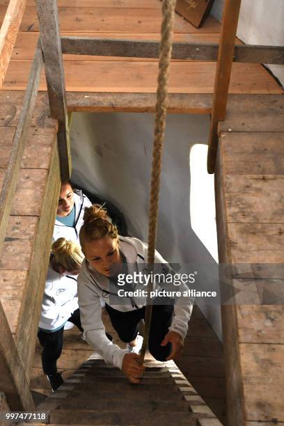 Germany's Leonie Maier climbs the stairs inside a windmill in Den Dungen, the Netherlands, 27 July 2017. Photo: Carmen Jaspersen/dpa