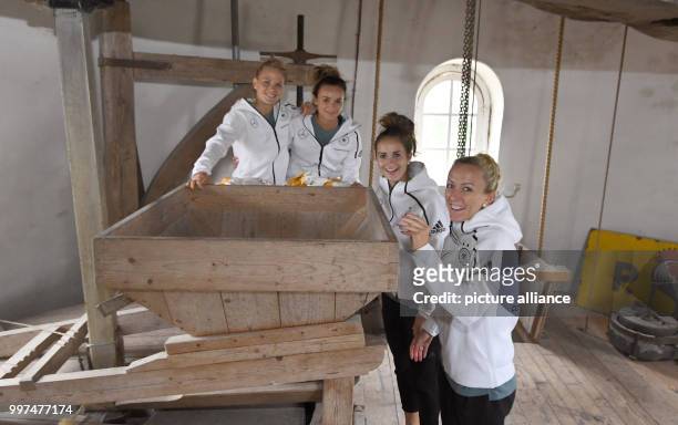Germany's Mandy Islacker, Sara Daebritz, Lina Magull and Leonie Maier pictured inside a windmill in Den Dungen, the Netherlands, 27 July 2017. Photo:...